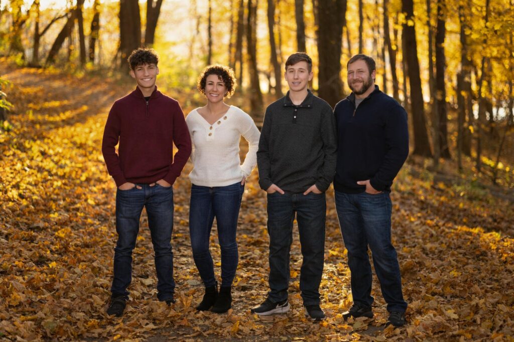 Senior photo of son with family