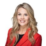 Gallery image of Professional headshot for business of realtor Erika Adornetto in red jacket