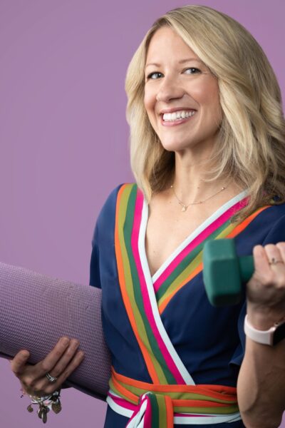 Portrait of sporty woman with healthy glow ready for training by professional Columbus photographer